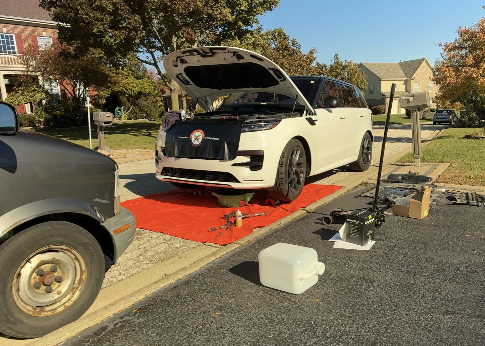 Mobile mechanic performing on-site car repair in Mount Prospect